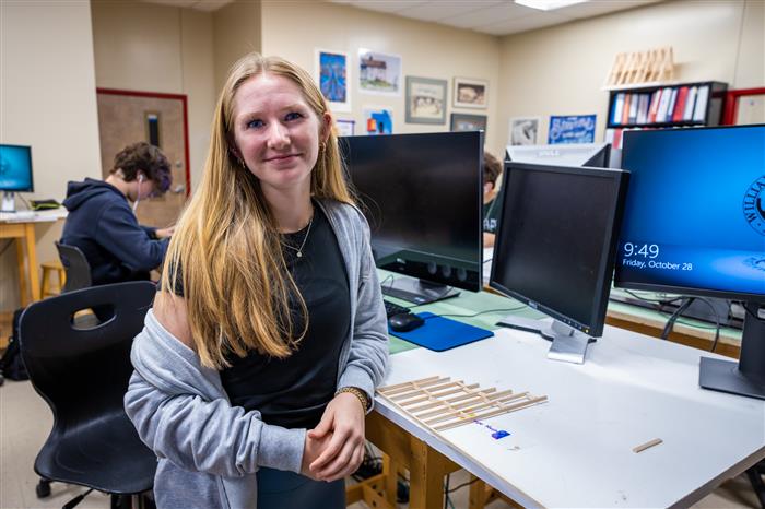 Female student sitting at a computer